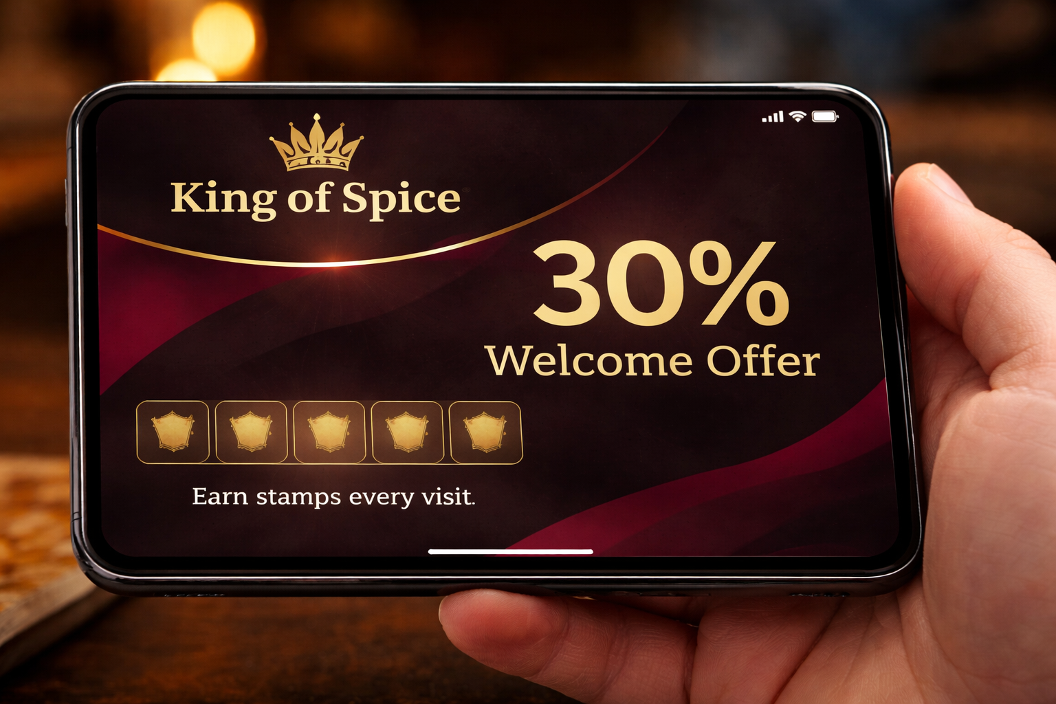 a smartphone showing King of spice VIP offer which is 30% off your first order